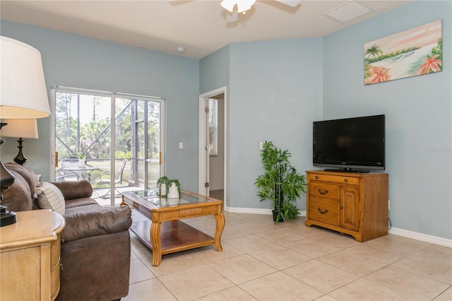 11954 Tempest Harbor Loop, Venice, FL 34292 - living room with a ceiling fan and light tile patterned floors