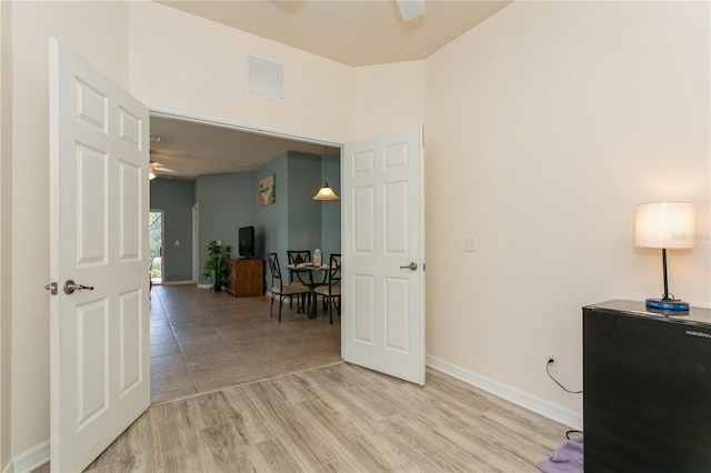 11954 Tempest Harbor Loop, Venice, FL 34292 - office area with ceiling fan and light wood finished floors