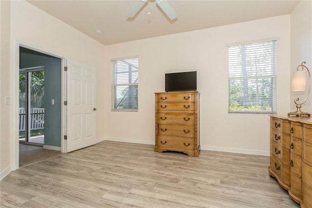 11954 Tempest Harbor Loop, Venice, FL 34292 - bedroom featuring light wood finished floors and multiple windows