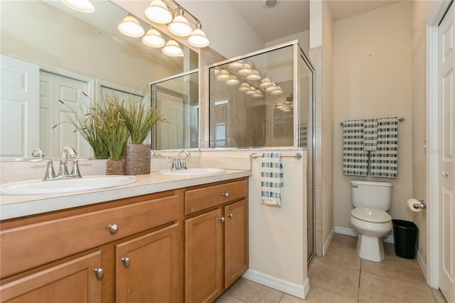 11954 Tempest Harbor Loop, Venice, FL 34292 - bathroom with double vanity, a shower stall, and tile patterned flooring