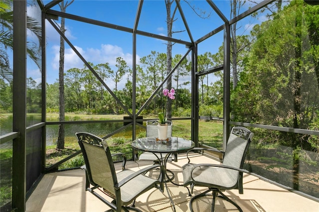11954 Tempest Harbor Loop, Venice, FL 34292 - sunroom / solarium with a water view and view of wooded area