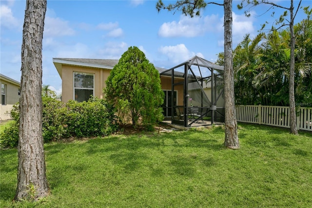 11954 Tempest Harbor Loop, Venice, FL 34292 - rear view of property with stucco siding and a lanai