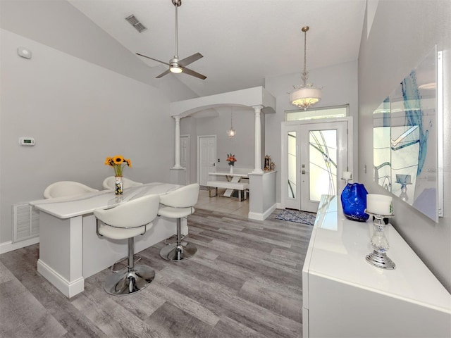 6505 Meandering Way, Lakewood Ranch, FL 34202 - bathroom featuring decorative columns, lofted ceiling, wood finished floors, and ceiling fan