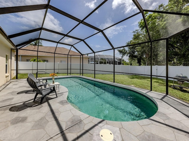 6505 Meandering Way, Lakewood Ranch, FL 34202 - view of swimming pool featuring a fenced backyard, a patio area, and glass enclosure