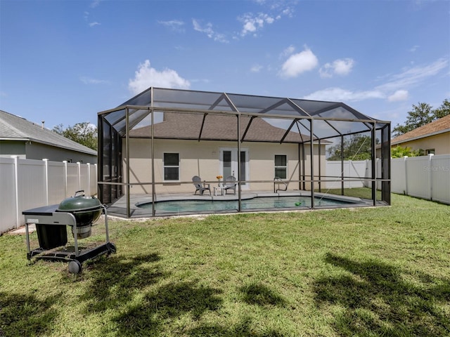 6505 Meandering Way, Lakewood Ranch, FL 34202 - rear view of property featuring a fenced backyard, a lanai, and a patio