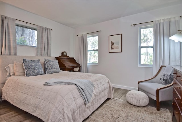 3340 Webber St, Sarasota, FL 34239 - bedroom with wood finished floors and baseboards