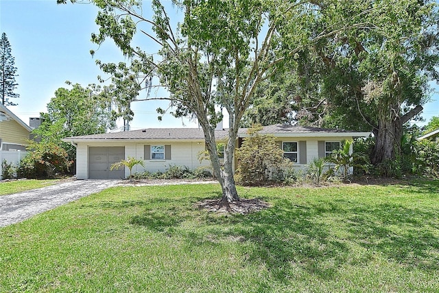 3340 Webber St, Sarasota, FL 34239 - ranch-style house featuring an attached garage, driveway, and a front yard