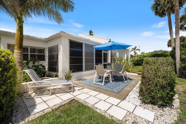 751 Capri Isles Blvd Unit 108, Venice, FL 34292 - view of patio with a sunroom