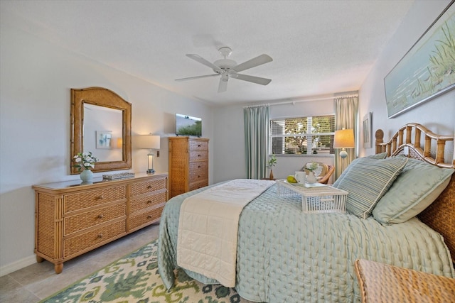 751 Capri Isles Blvd Unit 108, Venice, FL 34292 - bedroom featuring ceiling fan and baseboards