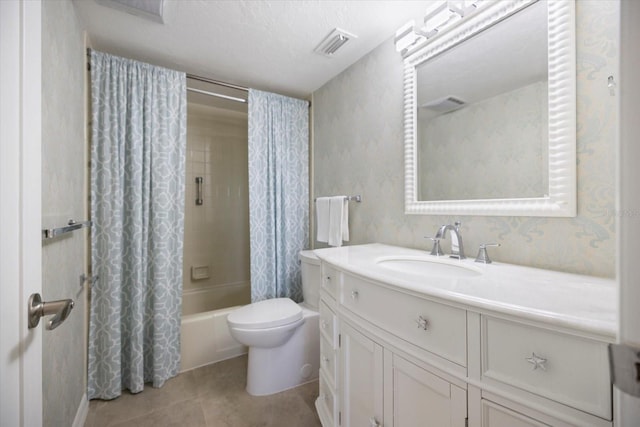 751 Capri Isles Blvd Unit 108, Venice, FL 34292 - bathroom featuring vanity, shower / tub combo, toilet, and tile patterned flooring