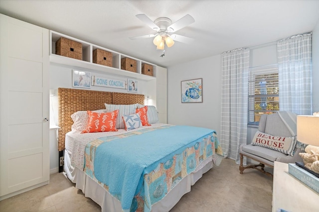 751 Capri Isles Blvd Unit 108, Venice, FL 34292 - bedroom with a ceiling fan and light tile patterned floors