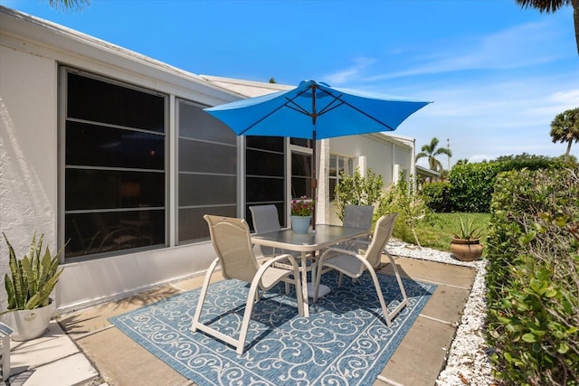 751 Capri Isles Blvd Unit 108, Venice, FL 34292 - view of patio / terrace featuring outdoor dining area