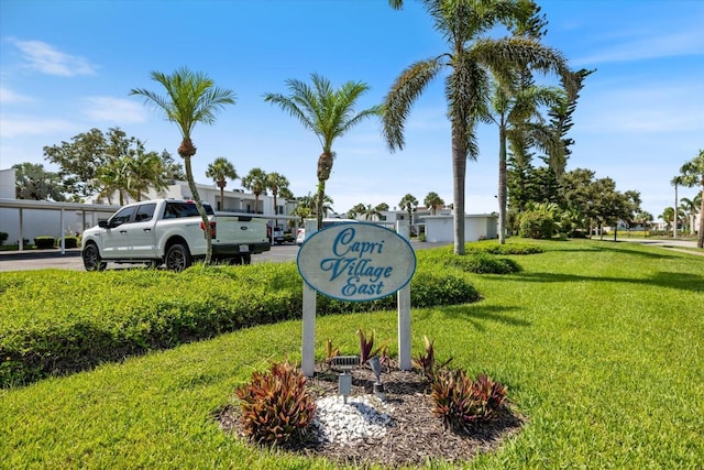 751 Capri Isles Blvd Unit 108, Venice, FL 34292 - community sign with a lawn