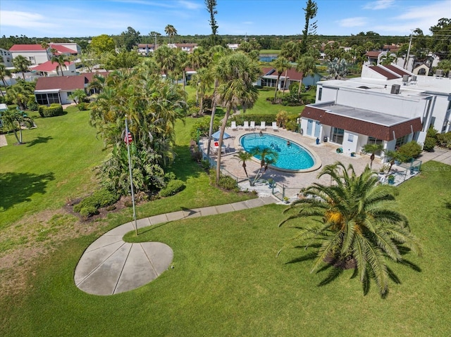751 Capri Isles Blvd Unit 108, Venice, FL 34292 - community pool with a yard, a patio, and a residential view