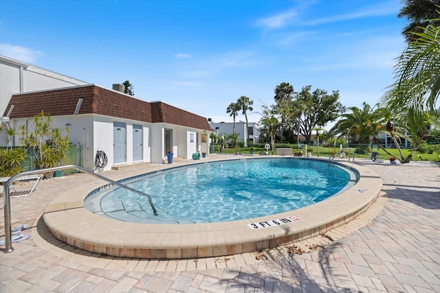 751 Capri Isles Blvd Unit 108, Venice, FL 34292 - community pool featuring a patio