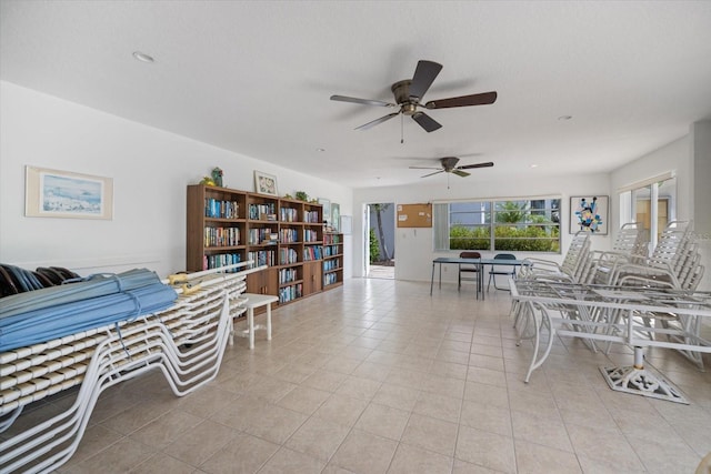 751 Capri Isles Blvd Unit 108, Venice, FL 34292 - living room featuring tile patterned flooring and a ceiling fan