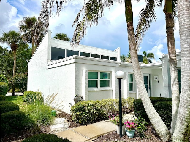 751 Capri Isles Blvd Unit 108, Venice, FL 34292 - art deco inspired home with stucco siding