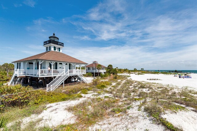 137 Mariner Ln, Rotonda West, FL 33947 - view of community featuring stairway and a water view
