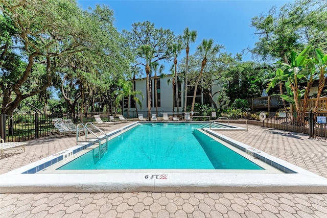 2718 Orchid Oaks Dr Unit C-202, Sarasota, FL 34239 - community pool featuring a patio area