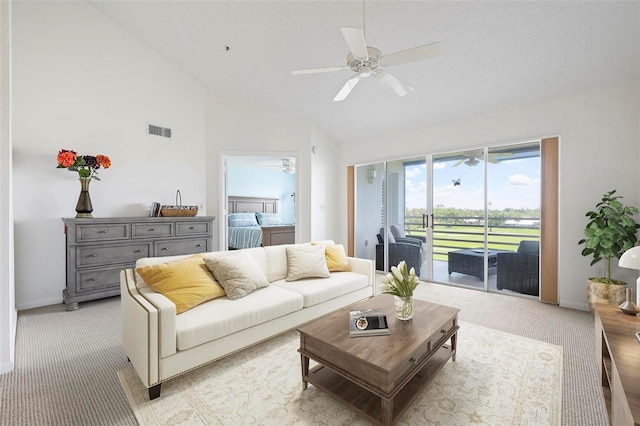 849 Wexford Blvd Unit 849, Venice, FL 34293 - living area featuring a ceiling fan, lofted ceiling, and light carpet