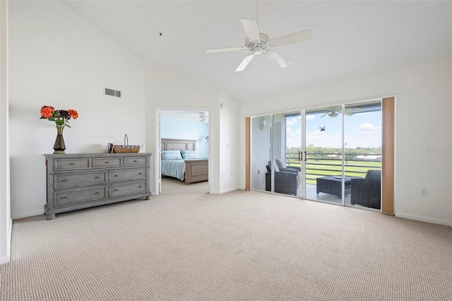 849 Wexford Blvd Unit 849, Venice, FL 34293 - bedroom with access to exterior, light carpet, high vaulted ceiling, and ceiling fan