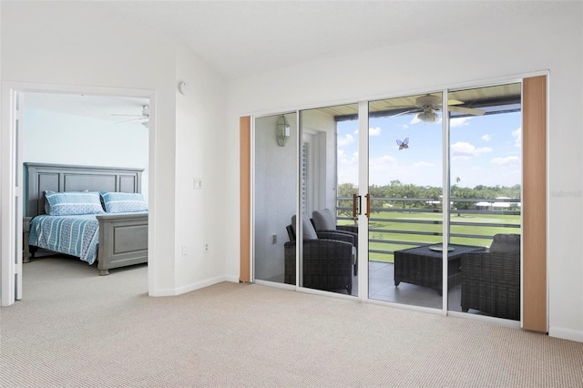 849 Wexford Blvd Unit 849, Venice, FL 34293 - carpeted bedroom featuring access to exterior and baseboards