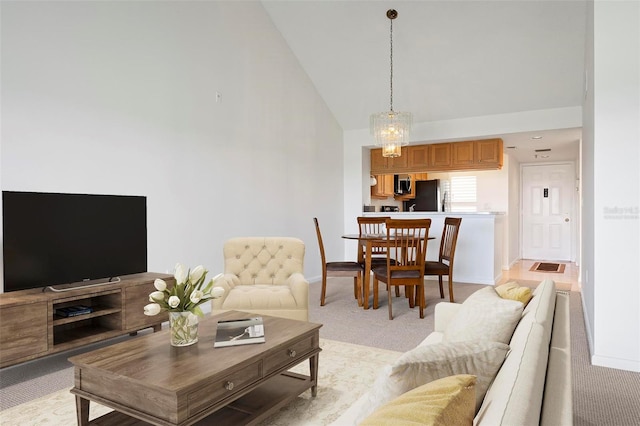 849 Wexford Blvd Unit 849, Venice, FL 34293 - living room featuring high vaulted ceiling and light colored carpet