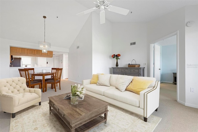849 Wexford Blvd Unit 849, Venice, FL 34293 - living room with light colored carpet, high vaulted ceiling, and ceiling fan