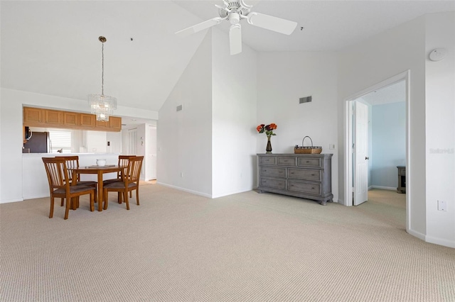 849 Wexford Blvd Unit 849, Venice, FL 34293 - dining space featuring light carpet, high vaulted ceiling, and a ceiling fan