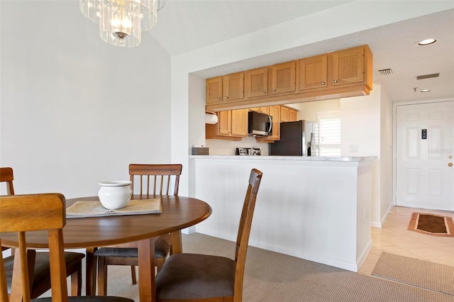 849 Wexford Blvd Unit 849, Venice, FL 34293 - dining room with light tile patterned floors, recessed lighting, and a chandelier