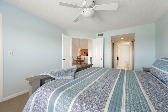 849 Wexford Blvd Unit 849, Venice, FL 34293 - bedroom featuring carpet, a ceiling fan, and a textured ceiling