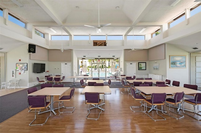 849 Wexford Blvd Unit 849, Venice, FL 34293 - dining space featuring a high ceiling, wood finished floors, ceiling fan, and beam ceiling