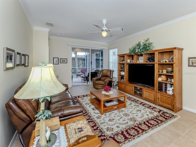 29704 Niagara Ct, Englewood, FL 34223 - living area featuring a ceiling fan, light tile patterned floors, and crown molding