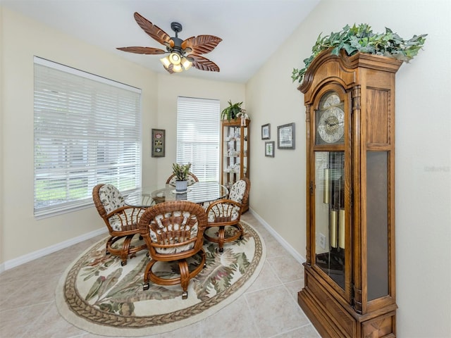 29704 Niagara Ct, Englewood, FL 34223 - dining area with ceiling fan and light tile patterned floors