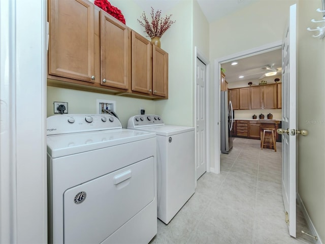 29704 Niagara Ct, Englewood, FL 34223 - laundry room with cabinet space, washer and dryer, light tile patterned floors, and recessed lighting