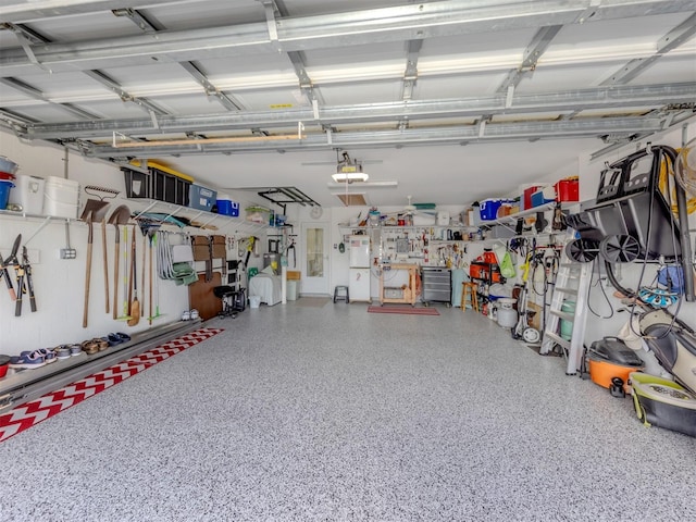 29704 Niagara Ct, Englewood, FL 34223 - garage featuring a garage door opener