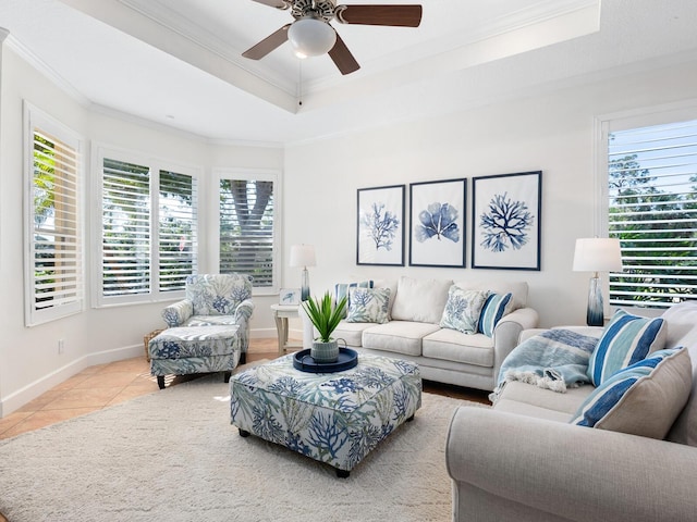 1164 Beachcomber Ct Unit 19, Osprey, FL 34229 - living area with ornamental molding, healthy amount of natural light, a raised ceiling, and ceiling fan