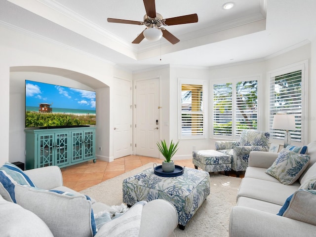 1164 Beachcomber Ct Unit 19, Osprey, FL 34229 - tiled living room featuring a raised ceiling, ornamental molding, ceiling fan, and recessed lighting