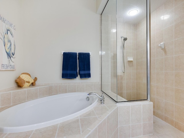 1164 Beachcomber Ct Unit 19, Osprey, FL 34229 - full bathroom featuring a garden tub and a walk in shower