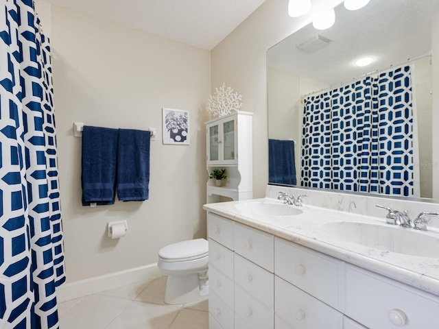 1164 Beachcomber Ct Unit 19, Osprey, FL 34229 - bathroom with tile patterned flooring, double vanity, and curtained shower