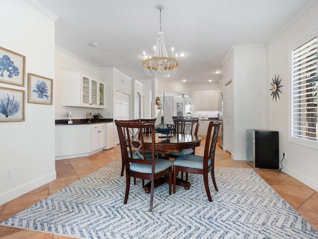 1164 Beachcomber Ct Unit 19, Osprey, FL 34229 - dining area with light tile patterned flooring, a chandelier, plenty of natural light, ornamental molding, and recessed lighting