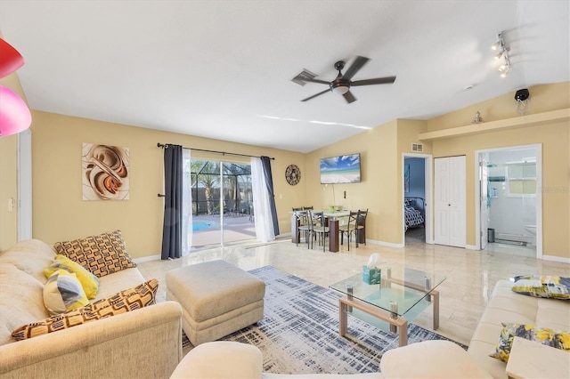 2445 Apache St, Sarasota, FL 34231 - living area featuring a ceiling fan and lofted ceiling