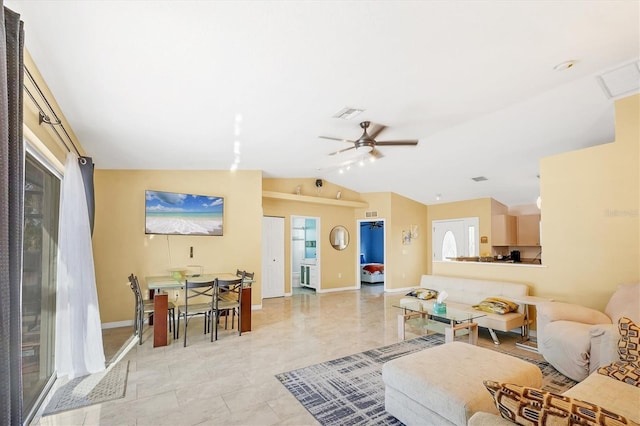 2445 Apache St, Sarasota, FL 34231 - living room with vaulted ceiling and a ceiling fan