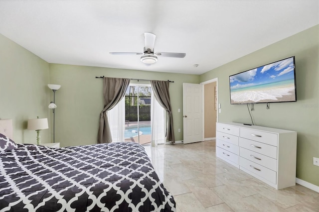2445 Apache St, Sarasota, FL 34231 - bedroom with access to outside, light marble finish flooring, and ceiling fan