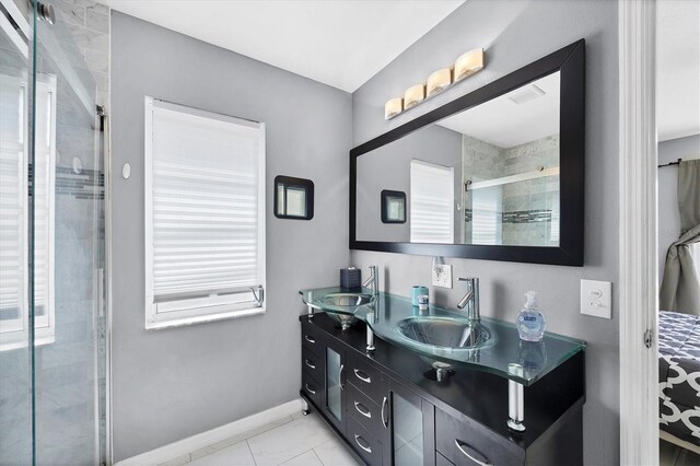 2445 Apache St, Sarasota, FL 34231 - bathroom featuring double vanity and a stall shower