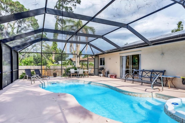2445 Apache St, Sarasota, FL 34231 - view of pool with a patio area, glass enclosure, grilling area, and outdoor dining area