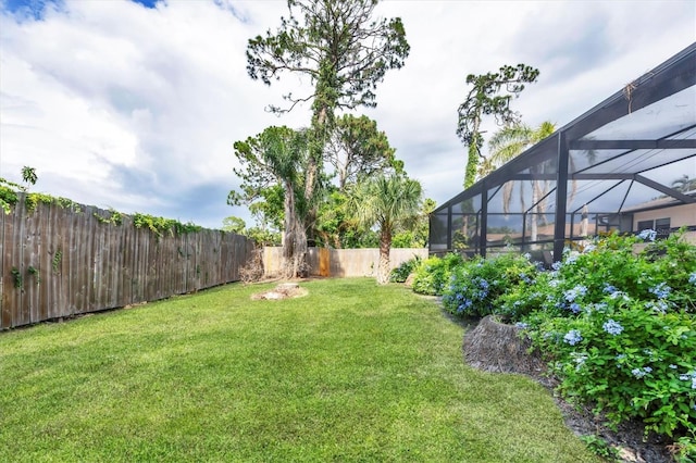 2445 Apache St, Sarasota, FL 34231 - fenced backyard with glass enclosure