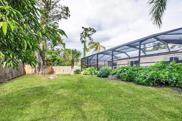 2445 Apache St, Sarasota, FL 34231 - fenced backyard with glass enclosure