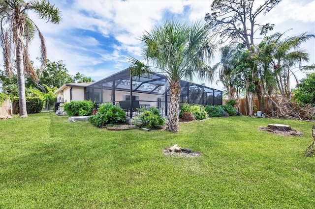 2445 Apache St, Sarasota, FL 34231 - fenced backyard featuring glass enclosure
