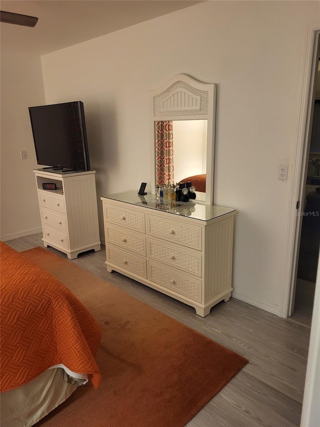 482 Pendleton Pl, Venice, FL 34292 - bedroom with wood finished floors and baseboards